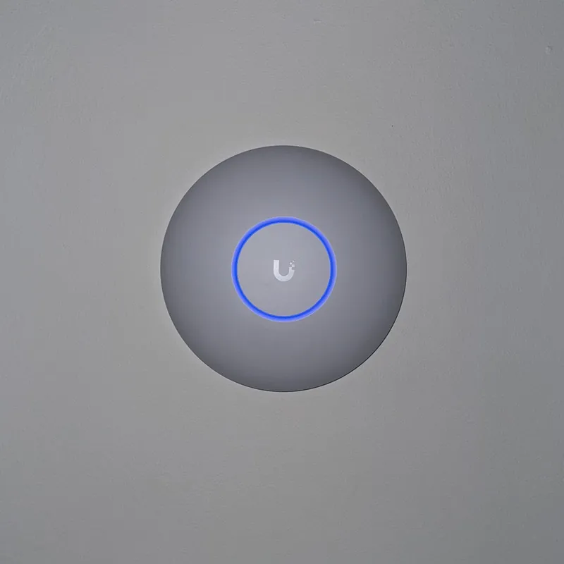 A second UniFi access point on a ceiling